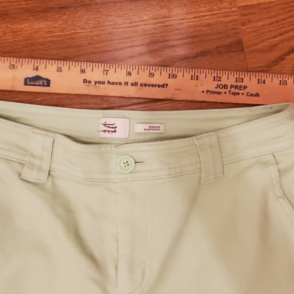 Pale green crop pants.